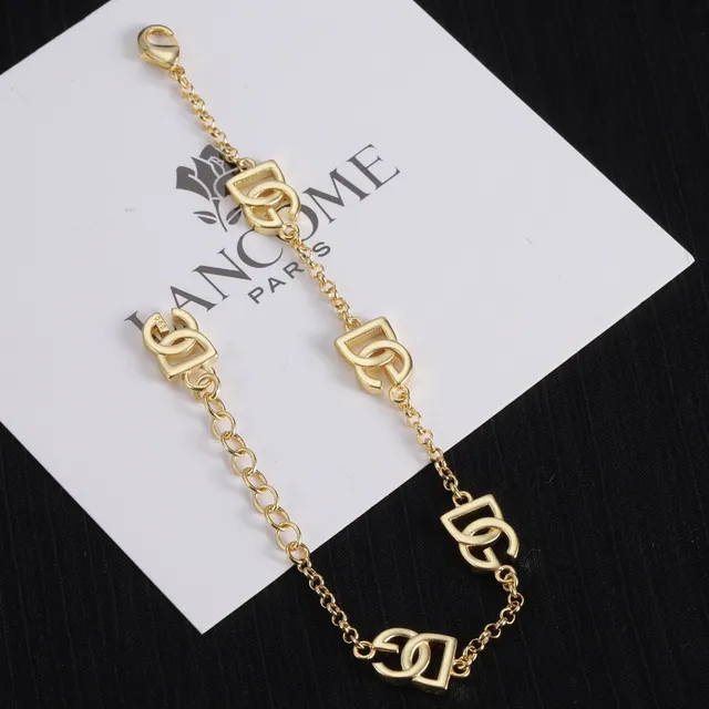 Lancôme Gold Chain Interlocking Logo Charms Bracelet