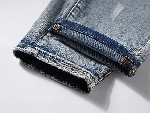Purple Brand Distressed Light-Wash Paint-Splatter Jeans