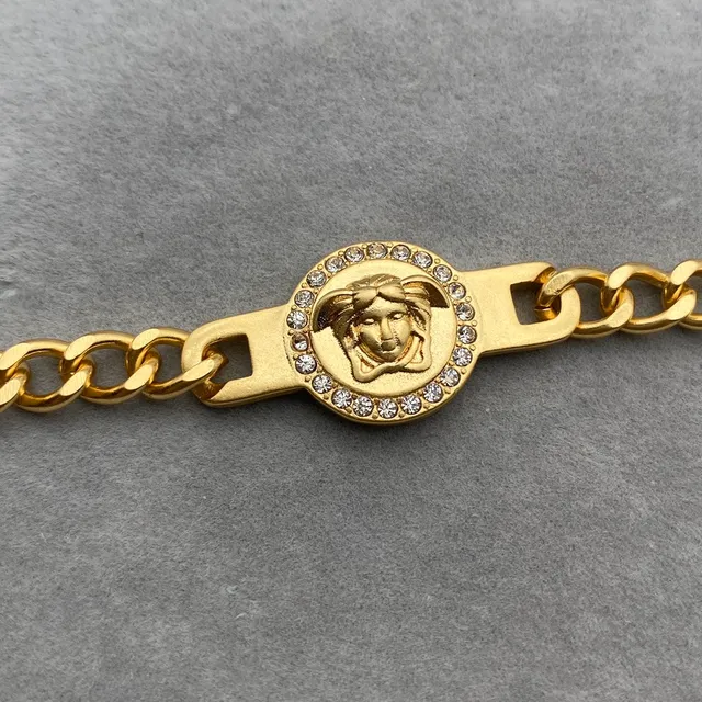 Versace Chain Reaction Medusa Head Crystal Bezel Gold-Tone Curb Chain Bracelets