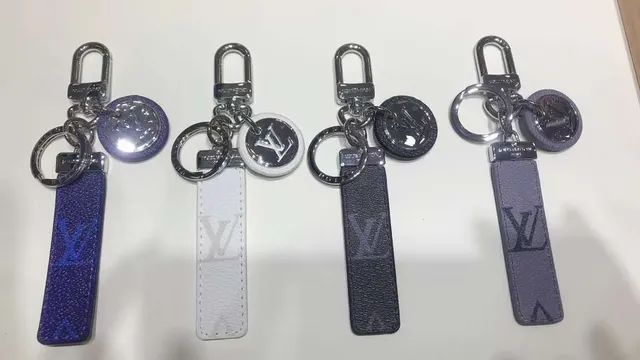 Louis Vuitton Blue White Monogrammed Leather Strap Circular Metallic Logo Charm Phone Case