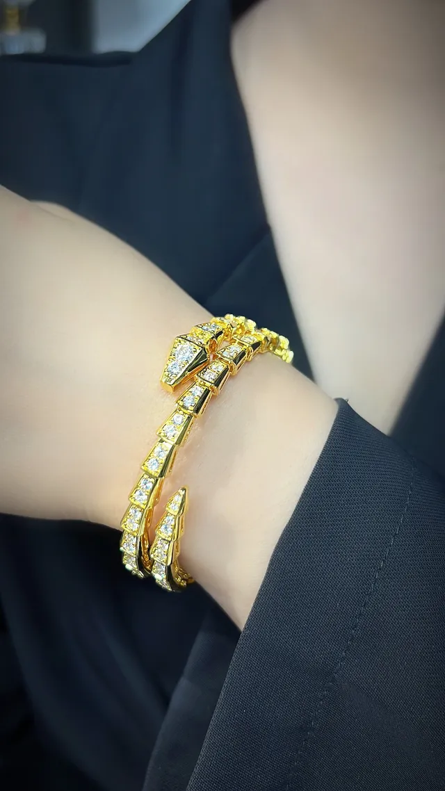 Bvlgari Gold Silver Coiled Serpentine Articulated Scale Motif Bracelet