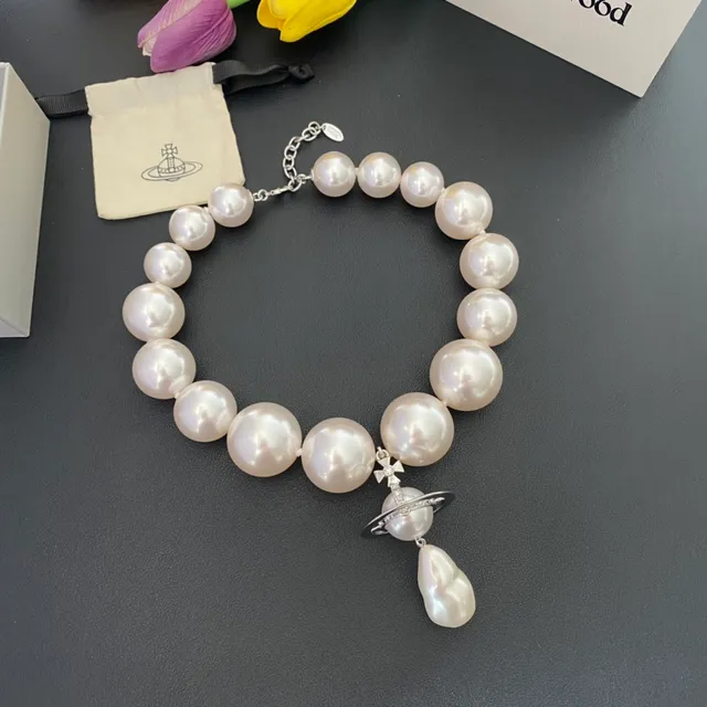 Vivienne Westwood Orb Necklace White Pearl Gold and Silver Tone Necklaces