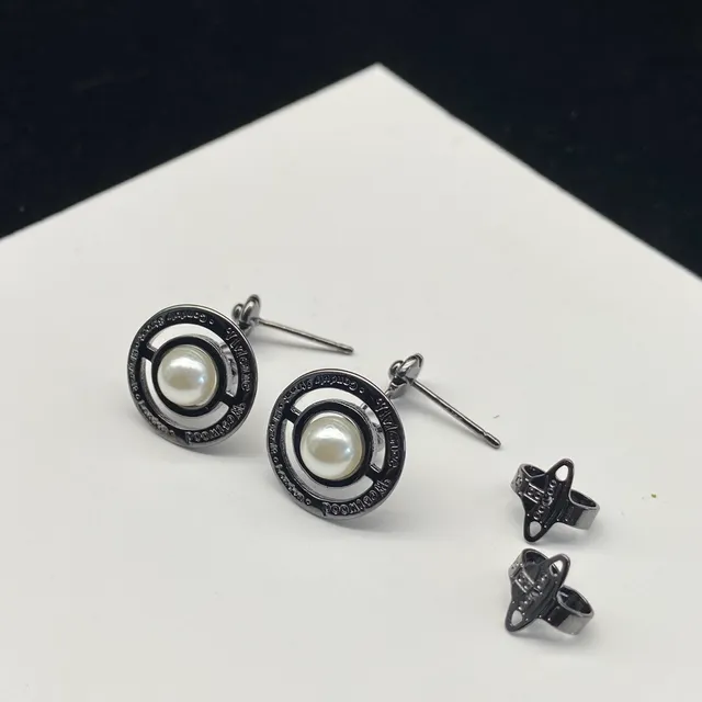 Vivienne Westwood Orb Pearl Black Gold Metallic Frame Central Cultured Earrings