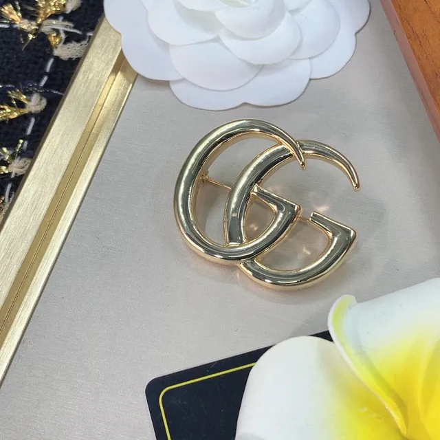 Gucci Double G Gold-Tone Interlocking Logo Brooch