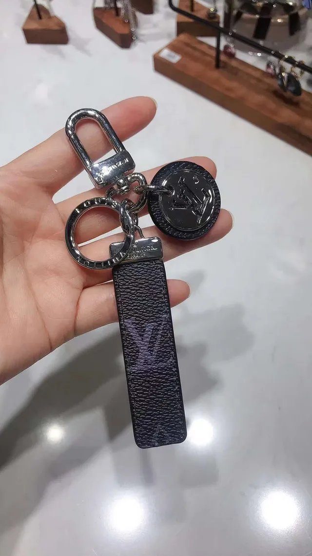 Louis Vuitton Blue White Monogrammed Leather Strap Circular Metallic Logo Charm Phone Case