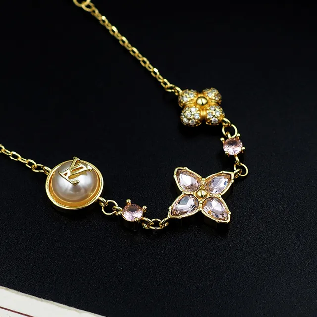 Louis Vuitton Gold-Tone Pearl and Pink Crystal Floral Charm Bracelet