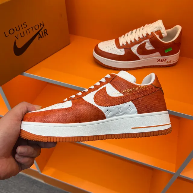Nike Air Force 1 Orange and White Embossed Monogram Lifestyle Sneakers