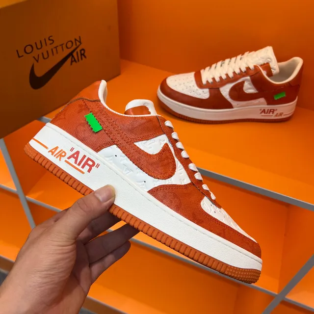 Nike Air Force 1 Orange and White Embossed Monogram Lifestyle Sneakers