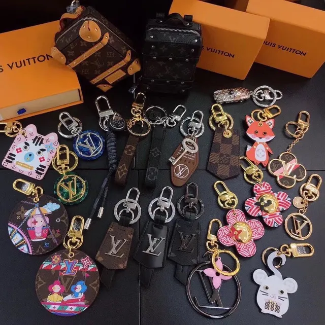 Louis Vuitton Multicolor Brown Circular Flat Leather-Like Phone Accessory
