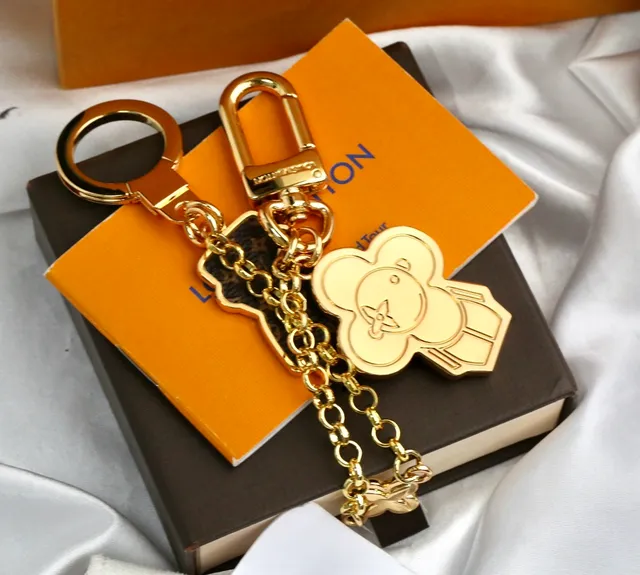 Louis Vuitton Monogram Flower and Vivienne Bear Gold Metal Engraved Phone Case