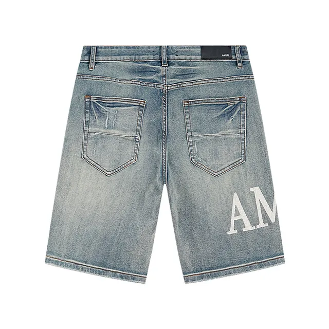 Amiri Logo-Print Distressed Light-Wash Denim Shorts