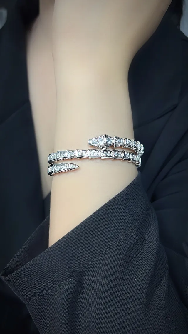 Bvlgari Gold Silver Coiled Serpentine Articulated Scale Motif Bracelet