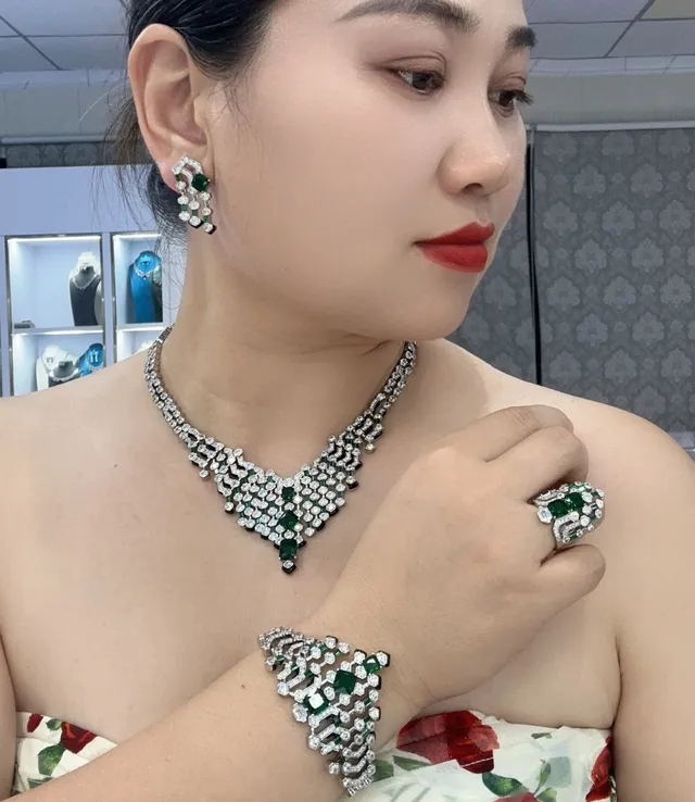 Emerald-Cut Green Gemstone and Diamond Art Deco Style Ring