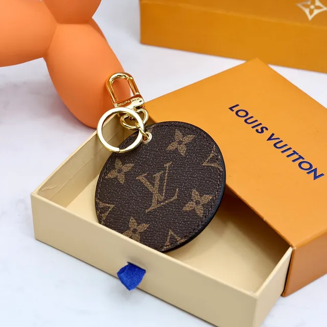 Louis Vuitton Black Gold Circular Engraved Disc Classical Profile Motif Crossbody Bag