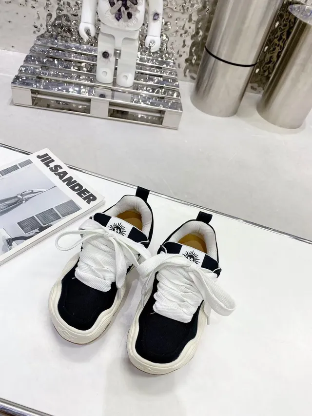 Jil Sander Black White Sculpted Wavy Midsole Canvas Upper Chunky Sneakers