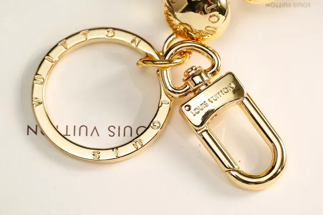 Louis Vuitton Silver Gold Articulated Stick-Figure Silhouette Coiled Torso Detail Crossbody Bag